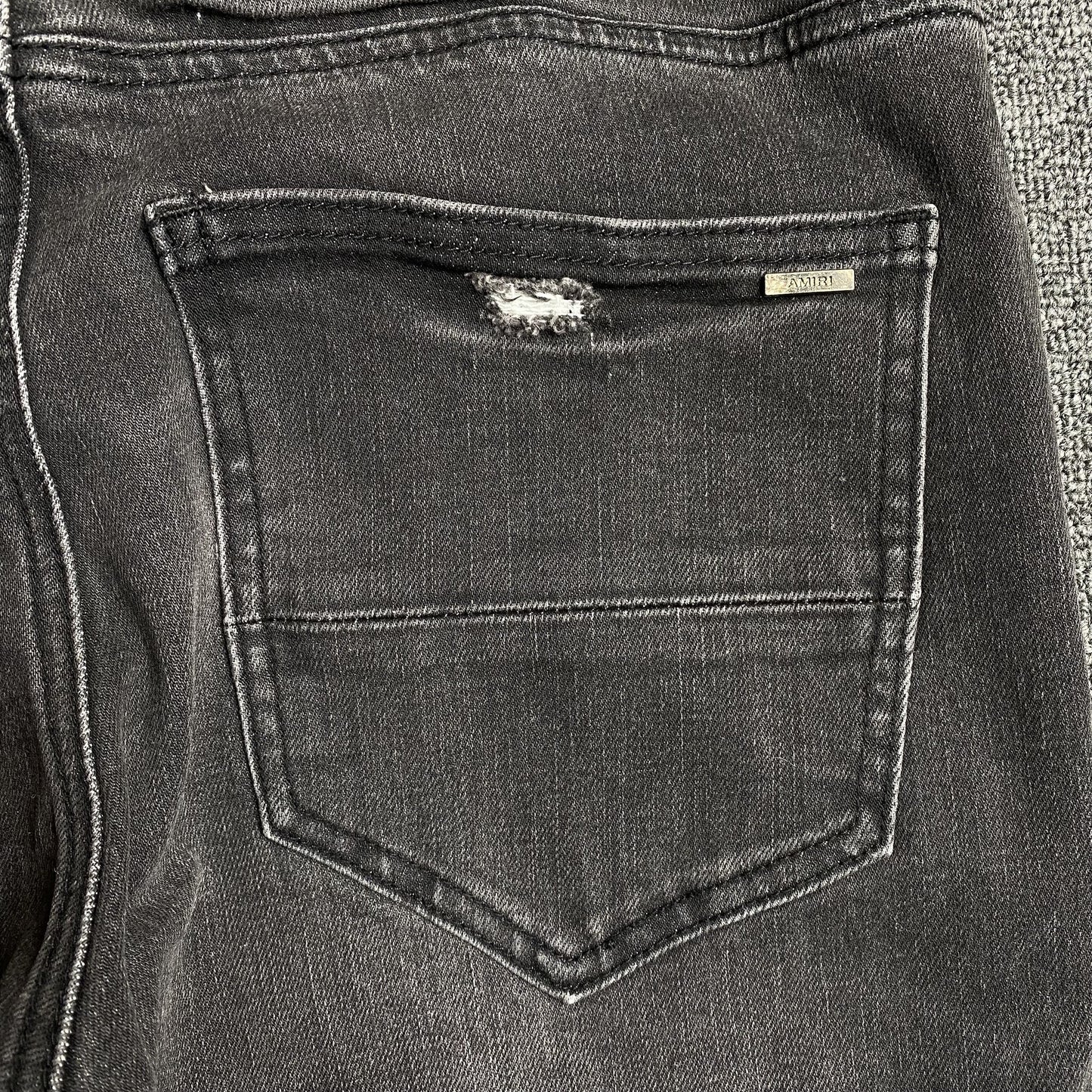 AMIRI SLASH SLIM JEANS